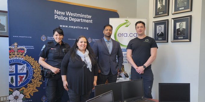 Community partner receiving donated laptops