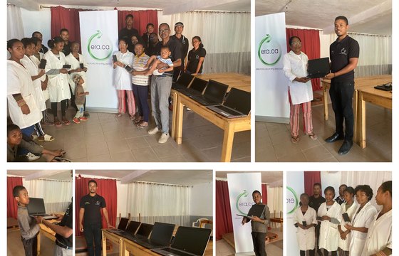 International donation recipients with laptops